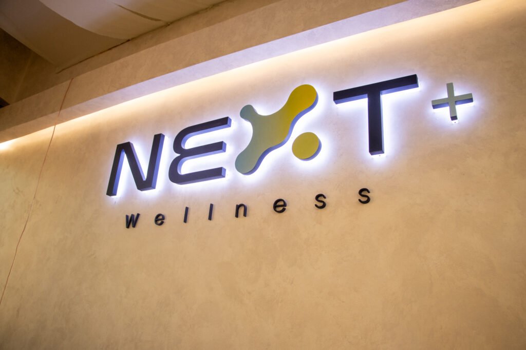 NEXT+ Wellness Center logo